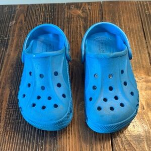 Crocs! Worn kids light blue crocs. Size 11.